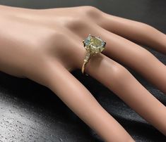 3.08 Carats Impressive Natural Aquamarine and Diamond 14K Yellow Gold Ring Suggested Replacement Value: Approx. $3,600.00 Total Natural Aquamarine Weight is: Approx. 3.00 Carats Aquamarine Measures: Approx. 10.00 x 8.00mm Natural Round Diamonds Weight: Approx. 0.08 Carats (color G-H / Clarity SI1-SI2) Ring total weight: Approx. 4.0 grams Disclaimer: all weights, measurements and colors are approximate and may vary slightly from the listed dimensions or as seen in the image. All pictures are magn Gold Sapphire Ring With Accent Stones For Formal Occasions, Formal Gold Sapphire Ring Gia Certified, Gia Certified Gold Sapphire Ring For Formal Occasions, Luxury Sapphire Ring For Proposal, Gia Certified Gold Sapphire Ring In 14k Gold, Gia Certified Gold Sapphire Ring, Luxury Gold Sapphire Cushion Cut Ring, Luxury Gia Certified Yellow Gold Sapphire Ring, Elegant Yellow Gold Ring With Aquamarine