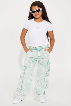 Available In Sage. Cargo Pockets Mid Rise Wide Leg 100% Cotton Elastic Waitband Model Wears Size 10 Imported | Mini Summer Camper Cargo Jean in Sage size 6 by Fashion Nova Kids Pants, Cargo Jeans, Jeans Jumpsuit, Pants Jeans, Matching Dresses, Girls Jeans, Women Girl, Dresses For Sale, Fashion Nova