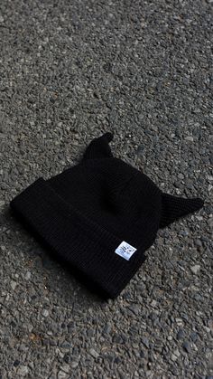 The horniest beanie you'll ever wear. The devil is in the details. Super warm and thick crocheted black beanie. Made with 100% high quality acrylic. Topped off with our signature logo cuff tag sewn in on the fold. Black Acrylic Beanie For Winter, Black Acrylic Hats For Fall, Black Acrylic Hat For Fall, Warm Black Acrylic Hat, Trendy Black Crochet Hat For Winter, Black Acrylic Hats For Cold Weather, Winter Acrylic Hat For Streetwear, Acrylic Winter Hat For Streetwear, Trendy Black Acrylic Hats