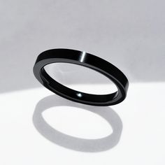 B.Tiff Plain Black Ceramic Ring Made with our special High Tech Ceramic, the ring emits a subtle ceramic sheen and is very smooth and comfortable on the finger. It is hypoallergenic and extremely durable. The High Tech Ceramic is scratch and tarnish resistant and will keep its shine for many years. This ring is unique and can stand alone or complement other pieces. This is a versatile ring that deserves a place in your collection. Specifications: High Tech Ceramic Black Color Available Width: 3m Tech Ring, Ceramic Ring, Ceramic Rings, Plain Black, Black Ceramic, Black Rings, High Tech, Black Color, Wedding Rings