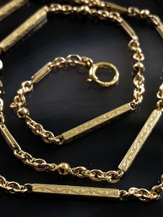 ⚜️ Art Deco Era WATCH CHAIN - NECKLACE CHAIN - For FOB, LOCKET, PENDANT CHAIN / 12K Gold Filled / Groom's Gift ⚜️ Rare and Unusual 21 Inches Long: These Longer Length Watch Chains Were Often For Larger Men - But Also For Women Because Their Waist Jackets Were Longer And Their Watch Usually Went Into Their Dress Jacket's Side Pocket (see antique photo example at end) ⚜️ Exquisitely Made - Fantastic Detail & Variation of Design Adding Interest and Texture with Art Deco Bar Links Separated by Oval Belcher Links, Small Trombone Links & Golden Balls Links ⚜️ Gender Neutral & Versatile Antique Chain - Use for Pocket Watch, Necklace, Pendants, layer it up Just Have Some Fun!   ⚜️ 21" Long x 3mm at Widest Point ⚜️  Hallmarked 12K Gold Filled on "C" Spring Ring and has been acid tested as 12K Gold Grooms Gift, Deco Bar, Art Deco Bar, Fancy Art, Dog Clip, Necklace Pendants, Jewelry Style, Watch Chain, Groom Gift