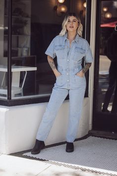 Free People Marci Denim Jumpsuit - Clear Skies-FREE PEOPLE-Jayden P Boutique Fitted Denim Jumpsuit With Pockets And Short Sleeves, Workwear Denim Jumpsuit With Short Sleeves, High Rise Denim Jumpsuit With Pockets In Utility Style, Medium Wash Denim Jumpsuit With Short Sleeve For Work, Medium Wash Fitted Denim Jumpsuit With Short Sleeves, Fitted Medium Wash Denim Jumpsuit For Work, Fitted Cotton Denim Utility Jumpsuit, Short Sleeve Denim Utility Jumpsuit For Workwear, Utility Style Denim Jumpsuit With Short Sleeves For Work