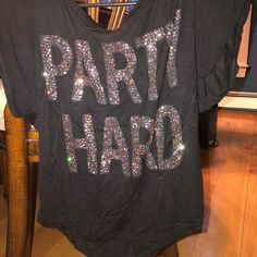 Never Worn Black T-Shirt With Glitter Spelling Party Hard. No Rips, Holes, Or Stains. Brand: A’gaci. Size: Small Glitter Cuss Word Shirt Sayings, Stretch T-shirt With Letter Print For Party, Crew Neck T-shirt With Letter Print For Night Out, Crew Neck T-shirt For Party Season Night Out, Black Stretch T-shirt For Party, Trendy Glitter Top For Party, Stretch Glitter Tops For Party Season, Party Season Sequined Crew Neck T-shirt, Trendy Glitter Tops For Party Season