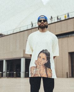 Kehlani Big Face Oversized Cream Tee – trainofthoughtcollective Oversized Screen Print Top With Drop Shoulder, Relaxed Drop Shoulder Streetwear T-shirt, Relaxed Drop Shoulder T-shirt For Streetwear, Oversized Relaxed Graphic T-shirt, Oversized Relaxed Graphic Print T-shirt, Relaxed Graphic Print Top For Streetwear, White Ferrari, Ferrari Racing, Kehlani