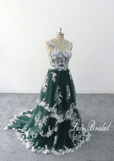 This is a customized product, please provide measurement and phone number when ordering. Thank you Lace Wedding Dress, A-line Dark green Tulle Lace Wedding Dress, Elegant Wedding Gown, Boho Wedding Gown with Corset Top 1.As always, Custom Made(your own size, your preferred color). 2.I carefully select high-quality beads, pearls, fabrics and threads to create every dress. 3.For this style, I need: 【Information required to place an order】 Color: 【Dark green tulle + ivory lace]】 Height: Bust: Waist Military Green Wedding Dress, White Dress With Green Accessories, White And Emerald Wedding Dress, Wedding Dress White And Green, Wedding Dress With Green Accent, Green And White Wedding Dresses, Green A-line Wedding Dress, Green Ball Gown With Sweetheart Neckline For Prom, A-line Green Gown For Prom Season