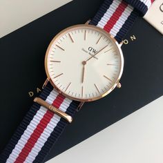 Brand New Daniel Wellington With The Original Box And The Tag. Dw White Dial Men's Watch Dw00100002 Case Size : 40 Mm Dial Color : White Crystal : Scratch Resistant Mineral Band Type : Strap Band Material : Nylon Band Color(S) : Blue, Red, White Water Resistance : 30 Meters / 100 Feet Casual White Everyday Watch, Classic Everyday Blue Watch, Casual White Watches For Gifts, Casual White Watches As Gifts, Classic White Watch For Everyday, Classic White Watch For Everyday Wear, Classic White Watch Accessories For Everyday, Classic White Watch For Everyday Use, Classic White Watch Accessories For Everyday Use