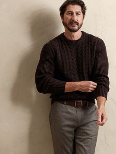 Artfully crafted from a rare reverse cable technique, this lofty sweater is knitted from luxurious Italian wool with a classic crew-neck silhouette.  Perfect for cabin mornings and brisk mountain excursions.  FROM ITALY'S FILPUCCI MILL: Fueled by a t Mens Formal Sweater Outfit, Sweater Wedding Outfit Men, Navy And Brown Outfit Men, Mens Brown Sweater Outfit, Brown Cable Knit Crew Neck Sweater, Classic Brown Cable Knit Sweater, Brown Merino Wool Cable Knit Sweater, Dark Autumn Men, Brown Sweater Outfit Men