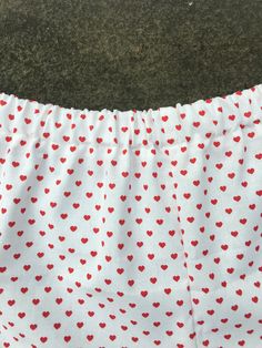 Red Heart Shorts. Great to wear for your next festival. Super cute high cut summer shorts. Super cute and really comfy shorts. Made from cotton with an elastic waist band. Great gift for a birthday, holiday or even a treat for yourself. All of my shorts are made to order so if you have a special request you can leave me a note with your order telling me your exact size specifications. If you don't see your size, if you need the shorts bigger or smaller just tell me and I can make it whatever siz Cute Short Red Bottoms, Cute Short-length Red Bottoms, Cute Summer Bottoms With Heart Print, White Heart Print Bottoms For Summer, Cute Red Summer Shorts, Red Short Length Bottoms For Festival, Red Short-length Bottoms For Festival, Red Summer Pajama Shorts With Elastic Waistband, Red Cotton Summer Pajama Shorts