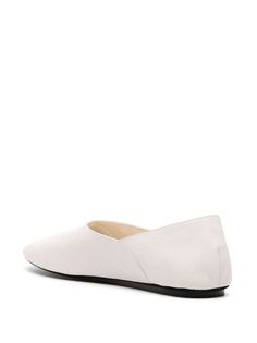 Jil Sander two-panel Leather Ballerina Flats - Farfetch Classic Slip-on Ballet Flats With Textured Sole, Slip-on Ballet Flats With Stitched Sole, Classic Ballet Flats With Leather Sole And Almond Toe, Cream Leather Closed Toe Ballet Flats, Classic Cream Pointed Toe Ballet Flats, Classic Almond Toe Ballet Flats With Leather Sole, Elegant Cream Slip-ons, Classic White Slip-ons With Flat Heel, Cream Leather Flat Slip-ons