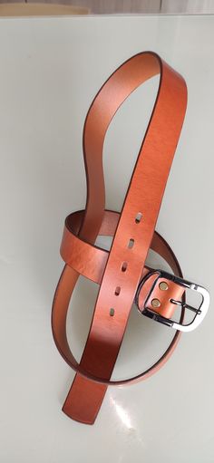 Cintura da donna in vera pelle con fibbia in acciaio, realizzata a mano con rifiniture di prima qualità. Made in Italy Height of lunghezza: 128 cm size: 3,7 cm spessore: 3,5mm Adjustable Leather Belt Buckles With Leather Strap, Adjustable Leather Belt Buckles, Adjustable Leather Belt Buckles With Buckle Closure, Luxury Adjustable Leather Belt Buckles, Adjustable Leather Belt With Rectangular Buckle, Leather Rectangular Belt Buckle, Adjustable Leather Belted Belts And Suspenders, Womens Leather Belt, Belt For Women