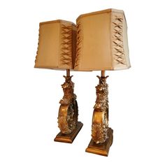 a pair of lamps sitting next to each other