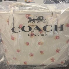 Coach City Tote With Pop Floral Print Chalk Multi 100% Authentic Coach !! Details: Printed Coated Canvas And Smooth Leather Inside Zip Pocket Snap Closure Handles With 10" Drop Dimensions: 13" (W) X 11 1/2" (H) X 6 1/4" (D) Color : Chalk Multi Size : Large Msrp : $350 Designer Large Capacity White Shoulder Bag, Designer White Bags With Large Capacity, Designer Large Capacity White Bags, Coach White Large Capacity Shoulder Bag, Designer White Coach Bag, White Coach Bucket Bag, White Bucket Bags, White Coach Shoulder Bag For On-the-go, Designer White Coach Shoulder Bag