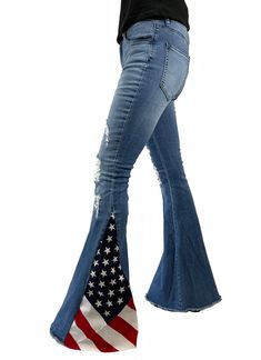 Flag flare denim bell bottom flare jeans are made of 98% cotton and 2% spandex. These are vintage inspired and showy. They are super comfortable and have some stretch to them. The size runs a little on the small side. Model is 5'7" 35-25-38 wearing a size small. Rise: 10” (approx.) Inseam: 33” (approx.) Slight stretch Zip-fly closure Front pockets Back pockets Flared leg Frayed hem Small 0/2/4 waist 25" to 27" Medium 4/6/8 waist 27" to 29" Large 8/10/12 waist 29" to 31" MADE IN THE U.S.A. Our gu Striped Flare Pants, Fringe Pants, Cute Fit, Fit Ideas, Denim Flares, Bell Bottom, Country Outfits, Women Clothing Boutique, Western Outfits