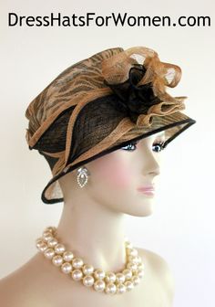 Ladies Black And Brown Beige Animal Print Sinamay Straw Designer Fashion Hat. This Dress Hat Is Suited For Weddings, Formals, Bridal, Mother Of The Bride, The Kentucky Derby And Horse Races.

Measurements: Crown Measures 22.5".  This lovely headpiece is suited for Spring, Summer or Early Fall.

All Sales Are Final. Fitted Black Fascinator For Summer, Black Summer Fascinator, Black Summer Hat For Wedding, Black Short Brim Fascinator For Summer, Fitted Beige Cloche Hat For Church, Black Short Brim Summer Fascinator, Black Summer Fascinator With Short Brim, Black Mini Hats For Summer Weddings, Vintage Black Mini Hats For Summer