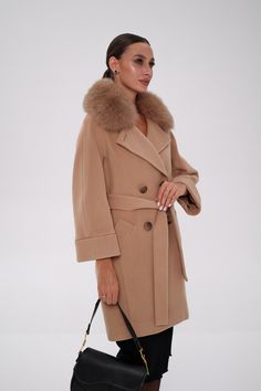 Description: A timeless wardrobe staple, this cashmere/wool coat exudes luxe sophistication. Plush genuine fur trim and classic fit - perfect fresh addition to new season's wardrobe. Product Details: Outer Fabric: 64% Cashmere, 33% Wool, 3% Elastane Genuine Polar fox fur (dyed) Please note: product color may slightly vary due to photographic lighting sources or your monitor settings. Each garment with natural fur will have slightly different color tone. Fur is detachable Lined for comfort with l Chic Wool Fur Coat With Faux Fur Trim, Luxury Beige Pea Coat For Winter, Luxury Long Beige Wool Coat, Luxury Wool Fur Coat For Winter, Beige Cashmere Wool Coat For Winter, Formal Wool Coat With Faux Fur Trim, Timeless Beige Winter Outerwear, Timeless Beige Outerwear For Winter, Luxury Wool Coat With Faux Fur Trim