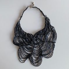 Beautiful Bib Necklace Brand New Black And Shimmery Graphite Color Purchased From Nordstrom But Unsure Of The Brand Adjustable Length Silver Necklaces With Round Beads For Party, Silver Necklace With Round Beads For Party, Metal Beaded Necklace With Black Beads For Party, Silver Beaded Choker For Evening, Metal Beaded Necklaces With Faceted Beads For Party, Metal Beaded Necklace With Faceted Beads For Party, Silver Beaded Necklaces For Evening, Silver Necklaces With Polished Beads For Party, Party Beaded Necklaces With Faceted Metal Beads