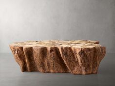 a table made out of wood with wavy edges