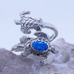 Sea Turtles adjustable spoon ring for LadiesMaterial: Sterling Silver 925Size Adjustable size 7 to 9Stamped "925"Gemstone: 5X7mm blue opal (or see selection for other choices)Beautiful creatures from the Oceans!ring for womenComes with jewelry boxready to ship Adjustable Opal Ring Jewelry, Adjustable Nickel-free Opal Jewelry, Adjustable Nickel-free Sterling Silver Opal Ring, Adjustable Nickel-free Silver Opal Ring, Nickel-free Adjustable Opal Rings, Adjustable Nickel-free Opal Ring, Adjustable Opal Rings For Gifts, Adjustable Nickel-free Opal Promise Ring, Nickel Free Adjustable Opal Promise Ring