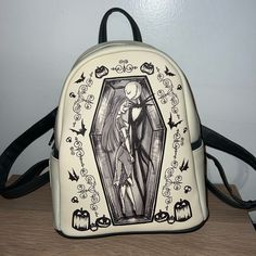 This Nightmare Before Christmas Jack And Sally Bag Is The Perfect Mini Backpack For Upcoming Spooky Season. It’s Never Been Used Before And From Hot Topic. It’s About The Size Of A Loungefly Backpack For Reference. Themed Backpack For Everyday Use And Halloween, White Halloween Backpack For Travel, White Halloween-themed Travel Backpack, Halloween Standard Backpack With Zipper Closure, White Halloween Backpack, Halloween White Backpack, White Backpack For Halloween, Themed White Backpack For Everyday Use, Sally Nbc