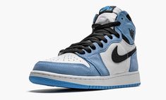 The Air Jordan 1 High GS “University Blue'' is the youth sizing of Michael Jordan’s first signature shoe in a colorway that references his alma mater, the University of North Carolina.  Fitted in kids sizing, the “University Blue” seen here gives an update to the classic and original “UNC” colorway of the Air Jordan 1 High.  The perforated toe and mid-panel display a crisp white tumbled leather construction.  Contrasting University Blue suede overlays can be found on the forefoot, eyelets, colla Jordan 1 High University Blue, Blue Jordans, Air Jordan 5 Retro, Air Jordan 1 Retro High Og, Black Wings, Air Jordan 1 Retro High, Stadium Goods, Nike Air Jordan 1, Air Jordan 1 High