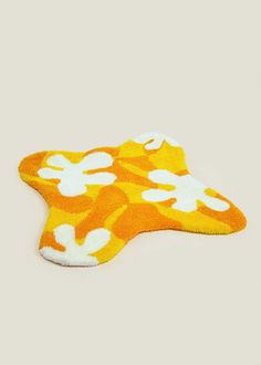 an orange and white animal shaped pillow