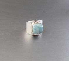 Larimar Ring , Blue Stone, Bridal Ring , Wedding Ring, Organic Ring, Sterling Silver Ring, Statement Ring, Gemstone Ring, Square Silver Ring............................................................................This is a highly spiritual stone that works effectively within all of the chakras from the heart chakra through to the crown chakra, including the higher heart, which aids compassion.It helps to release stored negative emotions such as angry thoughts, remembered pain and other detrim Adjustable Blue Larimar Ring, Larimar Gemstone Jewelry For Wedding, Wedding Larimar Gemstone Rings, Angry Thoughts, Ring Blue Stone, Ring Square, Blue Gemstone Rings, Larimar Ring, Larimar Rings