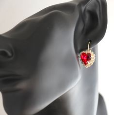 "Red Ruby rhinestone Heart lever back earrings Swarovski bridesmaids earrings, bridal jewelry - 18 k gold plated Rhinestones classic earrings Petite Delights is an Official SWAROVSKI® Branding Partner Official Swarovski Elements® Partner Made with real genuine high quality Austrian Swarovski ©Crystal . Our brand is legally licensed & authorized By Swarovski Company for high quality manufacturing. This pair comes with Swarovski genuine tag , this is unique to our store . They serve as a sign Red Heart Cut Elegant Earrings, Elegant Red Heart Cut Earrings, Red Heart Pendant Earrings For Anniversary, Red Heart-shaped Earrings For Wedding, Red Heart Drop Earrings For Wedding, Red Drop Heart Earrings For Wedding, Red Heart Earrings For Wedding, Red Dangle Heart Earrings For Wedding, Red Heart Charm Earrings For Anniversary