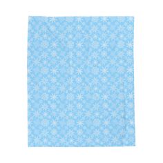 blue and white snowflakes on a light blue background home blanket by thepaperypenon's artist shop