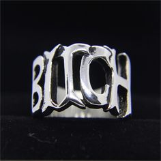 Make a statement with the stylish Punk Rock B Word Ring. Featuring an edgy design for those who take risks, this ring is sure to make an impression! Dare to be bold and show off your unique style for fun, but yet not so literal. BUY TWO & Get 3rd* item Free from our UNISEX Goth Jewelry Collection. *The Lowest Priced Item. Must add 3 items to the cart to see the discount applied at the check out. GENDER: UNISEX 316L Stainless Steel Not allergic, Does not rust, Not deformed Water, Heat, Sweat Resi Punk Rock Style, Word Ring, Fish Hook Bracelet, Sea Turtle Bracelet, Whale Necklace, Shark Earrings, Fish Hook Necklace, B Words, Compass Bracelet