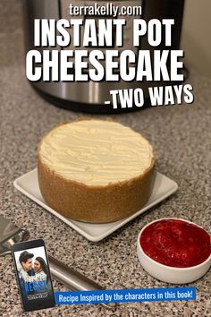 a cheesecake on a plate next to a bowl of ketchup and an instant pot