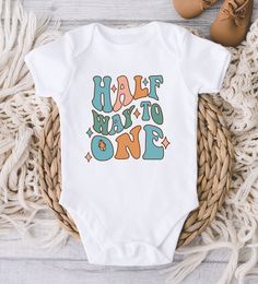 ** Quick Sizing Tip ** Baby ONESIES® Brand Bodysuits tend to run very small so we recommend sizing up for a better fit and to give baby longer wear time because they grow so fast. Toddler shirts are true to size. 📋 HOW TO ORDER: ✧ Choose Baby ONESIES® Brand Bodysuit or shirt size (sizing chart below) and sleeve length ✧ Select design color if applicable ✧ For personalized designs - enter customization in "Add your personalization" field ✧ ADD TO CART ✧ Select from our shipping class options (al Half Birthday Shirt Boy, Half Birthday Baby Boy, Half Birthday Shirt, Half Way To One, Half Birthday Baby, Birthday Bodysuit, Gerber Organic, 2nd Birthday Boys, 2nd Birthday Shirt