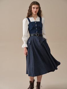 Imagine strolling through a meadow, the soft wool gently swaying with each step. The skirt's graceful silhouette and delicate pattern evoke a sense of romance, transporting you back to a bygone era of refined charm.The premium wool material ensures you'll feel luxurious and warm, perfect for tackling those trans-season Fall Dresses With Voluminous Long Skirt, Fall Voluminous Lined Skirt Dress, Fall Voluminous Dress With Lined Skirt, Fall Dresses With Lined Voluminous Skirt, Fall Dress With Voluminous Lined Skirt, Fall Dresses With Ruffled Long Skirt, Fall Daywear Tiered Skirt, Fall Tiered Skirt For Daywear, Long Lined Skirt Dress For Fall