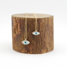 "Absolutely EYE catching! A beautiful mother of pearl with an inlaid evil eye. I paired this one with a beautiful beaded curb chain. This beauty will keep bad spirits at bay, and good ones in your corner! Enamel Evil Eye bracelet, Gold Evil Eye necklace, 925 Silver sterling, Handmade Jewelry Your choice Sterling silver with gold plated chain. *the chain and the rest of the metal components are gold plated *if you need longer chain can be upon request. Leave me a note on \"message to the seller\" Sterling Silver Evil Eye Jewelry For Gifts, Sterling Silver Evil Eye Necklace For Gift, Eye-shaped Amulet Necklace As Gift, Amulet Eye Necklace Gift, Symbolic Eye-shaped Jewelry Gift, Spiritual Sterling Silver Evil Eye Necklace, Spiritual Sterling Silver Necklace With Diamond Eyes, Amulet Style Jewelry With Diamond Eyes For Gift, Spiritual Sterling Silver Eye-shaped Jewelry