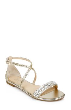 a women's gold sandal with crystal embellishments