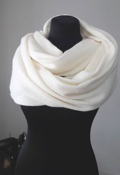 Warm ivory shawl made of high quality and soft angora to add an elegant touch to your everyday look or a special occasion, wedding, party. Beautiful shawl to to warm you up on a cold but beautiful day. For more wedding tops and boleros, please access https://www.etsy.com/shop/LidiasBoutiqueDesign?ref=seller-platform-mcnav&section_id=23157300. For more wedding dresses, please access https://www.etsy.com/shop/LidiasBoutiqueDesign?ref=seller-platform-mcnav&section_id=23157290. For more wedd Wedding Tops, Bridesmaid Shawl, Shawl Wedding, Wedding Shrug, Shrugs And Boleros, Winter Shawl, Bridal Shawl, Wedding Cape, Wedding Shawl