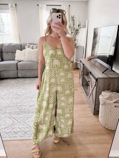 Our Florida Dreaming Boho Jumpsuit features a fun palm tree pattern print, v-neckline, adjustable straps, boho relaxed style fit, back tie detail, wide leg hemline. Model is 5'1", 34D, 6/28 and is wearing a size small. Item runs oversized. More details:100% polyester. hand wash or wash on cold and hang to dry. Green Tropical V-neck Jumpsuits And Rompers, Tropical V-neck Jumpsuits And Rompers For Vacation, Tropical Printed V-neck Jumpsuits And Rompers, Casual V-neck Jumpsuits And Rompers With Tropical Print, Summer Wide Leg Jumpsuits And Rompers For Vacation, Summer Wide-leg Jumpsuits And Rompers For Vacation, Summer Wide-leg Jumpsuits For Vacation, Green V-neck Tropical Print Jumpsuits And Rompers, Green V-neck Tropical Print Jumpsuit