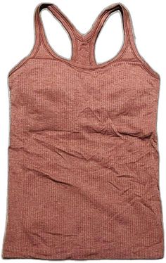 a women's tank top with straps on the front and back, in pink