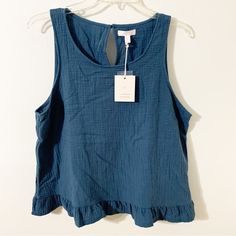 Nwt Lc Lauren Conrad 100% Organic Cotton Sleeveless Blouse Ruffled Hem Key Hole Back Pre-Owned Condition. Excellent Nwt Condition. Pit To Pit:20” Length:24.5” 100% Organic Cotton Sleeveless Ruffled Hem Key Hole Back Pullover Scoop Neck Machine Wash Line Dry Cotton Sleeveless Blouse, Long Sleeve Peasant Top, Blue Lace Blouse, Lace Bell Sleeve Top, Heart Blouse, Sheer Floral Blouse, Lace Trim Blouse, Gold Blouse, Gingham Tops