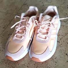 Brand New Ozelle Cloud Foam Technology Adidas Running Sneaker Shoes * White/Peach/Dusty Pink * Size 7.5/ 38 * Foam Technology * Pull On Style * Suede Details Adidas Pink High-top Running Shoes, Pink Synthetic Sneakers For Jogging, Pink Adidas Running Shoes With Laces, Peach Low-top Sports Sneakers, Adidas Pink Low-top Running Shoes, Adidas Pink Sneakers For Jogging, Sporty Peach Lace-up Sneakers, Peach Lace-up Sneakers For Sports, Pink Adidas Running Shoes With Cushioned Footbed