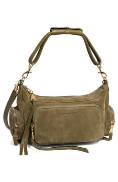 A plenitude of roomy pockets and a removable strap enhance the functionality of this suede satchel finished with logo-print lining. Top zip closure Top carry handles; removable, adjustable crossbody strap Exterior zip and slip pockets; side zip pockets Interior zip, wall and smartphone pockets Structured silhouette with flat base and protective metal feet Logo-print lining Leather Imported Feet Logo, Crossbody Strap, Logo Print, Side Zip, Zip Pockets, Satchel, Handles, Smartphone, Nordstrom