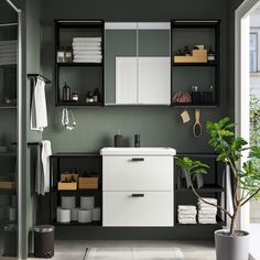 the bathroom is clean and ready to be used as a storage area for towels, toiletries and other items