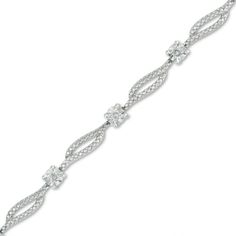 Make an elegant statement with this darling diamond fashion bracelet. Expertly crafted in sleek sterling silver, this bracelet features twisting textured ribbons separated by shimmering diamond accent stations. A lovely look anytime, this 7.25-inch bracelet is finished with a bright polished shine and secures with a durable lobster claw clasp. Diamond Fashion, Diamond Bracelets, Christmas Sale, White Metal, Diamond Stone, Diamond Clarity, Bracelet Designs, Lobster Claw, Fashion Bracelets