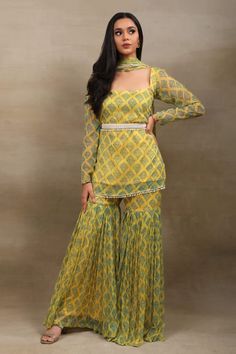 Yellow kurta with floral hand block prints. Paired with coordinating sharara and dupatta. - Aza Fashions Fitted Georgette Sharara For Designer Wear, Designer Pista Green Sharara With Unstitched Blouse, Fitted Pista Green Sharara With Unstitched Blouse, Fitted Pista Green Georgette Sharara, Yellow Georgette Palazzo Set With Long Sleeves, Pista Green Fitted Sharara With Unstitched Blouse, Pista Green Fitted Sharara With Cutdana, Fitted Pista Green Sharara With Cutdana, Fitted Pista Green Georgette Palazzo Set