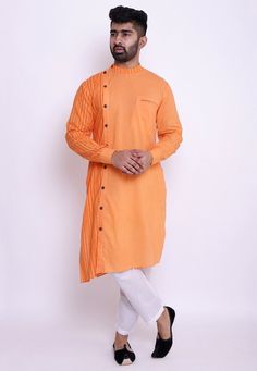 Readymade Cotton Asymmetric Kurta in Orange. This Collar Neck and Full Sleeve attire is Prettified with Wooden Buttons and Stripe Print and has Two Side and One Welt Pocket. Do note: Bottom and Footwear shown in the image is for presentation purposes only. Half to one inch may vary in measurement. (Slight variation in actual color vs. image is possible). We sell all kinds of menswear. Mens Kurta | Mens Kurta Pajama | Mens Sherwani | Mens Sherwani Sets | Traditional Menswear | Partywear Menswear Spring Orange Cotton Kurta, Casual Orange Kurta For Summer, Orange Cotton Long Sleeve Kurta, Fitted Orange Kurta For Summer, Long Sleeve Orange Kurta For Summer, Orange Long Sleeve Kurta For Summer, Long Sleeve Orange Cotton Kurta, Orange Long Sleeve Kurta For Spring, Summer Long Sleeve Orange Kurta