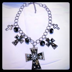 Silver And Black Cross Charms Necklace With Rhinestone Accents. Used Twice In Brand New Condition. Black Crystal Jewelry With Jeweled Details, Black Crystal Jeweled Jewelry, Black Jeweled Crystal Jewelry, Black Bling Necklaces For Party, Black Jewelry With Silver Chain For Party, Party Black Jewelry With Silver Chain, Black Costume Jewelry With Rhinestones, Black Rhinestone Costume Jewelry, Black Metal Jewelry With Silver Chain