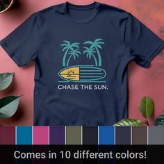 a t - shirt that says chase the sun with a surfboard and palm trees