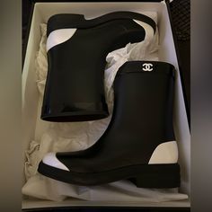 100% Authentic Brand New Chanel Rainboots In Size 38. Barely Worn Around The Parking Lot Outside. Includes Original Box Chanel Rainboots, Shoes Chanel, Black And White Color, Parking Lot, Black And White Colour, Chanel Shoes, Winter Rain, White Color, Rain Boots