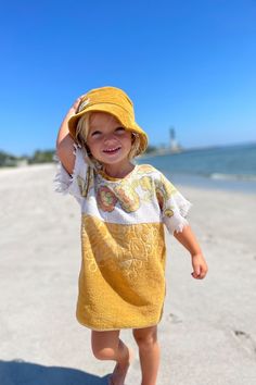 Your little one will look so stylish in this stylish Yellow Bucket Hat. Perfect for those days by the beach, or any other summer day, this hat will keep your baby or toddler protected from the sun while they look absolutely adorable. Made from light-weight corduroy, it fits comfortably and makes the perfect accessory for a beach day. Shop now and add this stylish hat to your baby or toddler's wardrobe. Cheap Spring Bucket Hat For Playtime, Playful Cheap Sun Hat For Outdoor Use, Playful Cheap Sun Hat For Outdoor, Cheap Summer Sun Hat For Play, Cheap Playful Sun Hat For Outdoor, Cheap Yellow Sun Hat For Outdoor Use, Cheap Playful Summer Sun Hat, Cheap Fun Yellow Sun Hat, Cheap Cotton Hats For Play