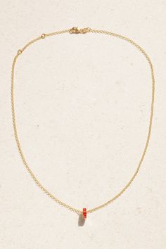 Foundrae's 18'' necklace is strung with an enameled bead that spells out ' Fuerza ' - which translates to 'Strength' - and has a carefully carved heart at its center. It's handmade from 18-karat gold and can be stacked with more of the sentimental charms, depending on what you want to hold close to you that day. The 18-inch chain can be adjusted between a variety of lengths. Classic Pendant Necklace With Single Strand, Classic Necklace With Delicate Chain And Heart Pendant, Heart Pendant Diamond Necklace With Adjustable Chain As Gift, Heart Pendant Diamond Necklace With Adjustable Chain, Diamond Heart Pendant Necklace With Adjustable Chain, Delicate Yellow Gold Jewelry With Rolo Chain, Yellow Gold Charm Necklaces With Rolo Chain For Gift, Fine Jewelry Pendant Necklace With Single Strand, Fine Jewelry Rolo Chain Necklace As Gift