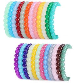 a bunch of bracelets with different colored beads